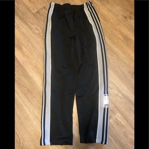 Adidas snap pants. 1 pair of youth medium in GUC
